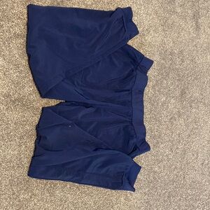 Large, petite, navy blue scrub pants. Many pockets